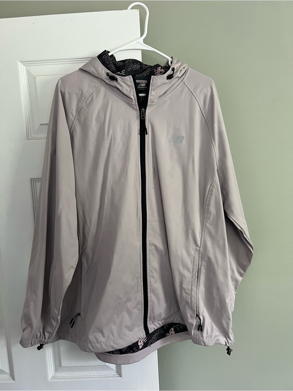 New Balance women’s Light purple Hooded Windbreaker Jacket